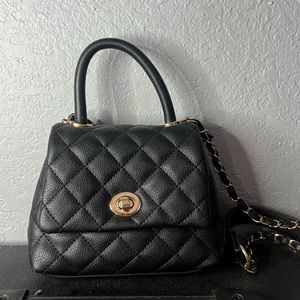 Black mini purse in great condition !